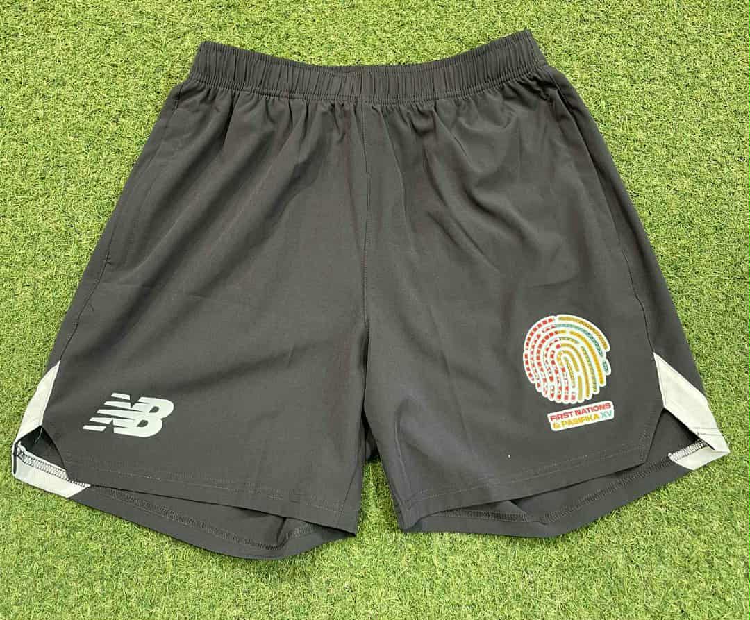 NEW BALANCE FIRST NATIONS AND PASIFIKA TRAVEL SHORTS MENS